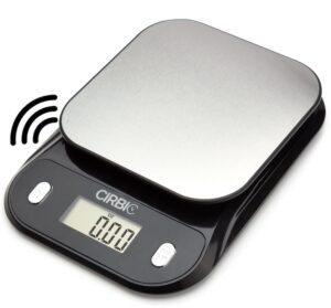 Silver, square plate on rectangular base with a screen displaying 0.00 ounces and a button on each side of the screen
